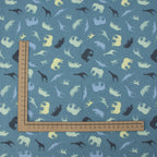 Jersey Safari Blau – Jerseystoff mit Tier-Silhouetten auf blauem Hintergrund