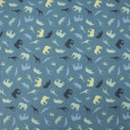 Jersey Safari Blau – Jerseystoff mit Tier-Silhouetten auf blauem Hintergrund