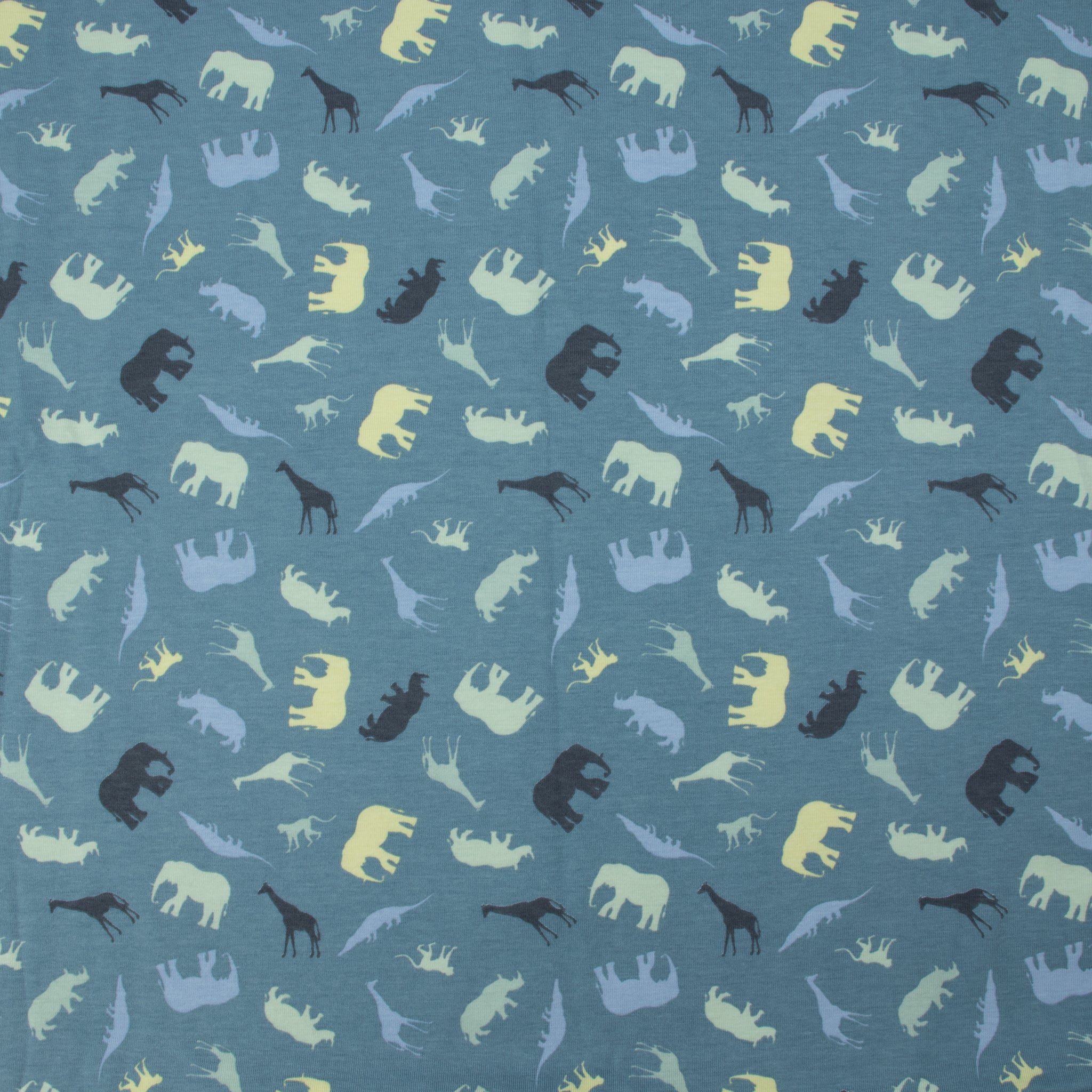 Jersey Safari Blau – Jerseystoff mit Tier-Silhouetten auf blauem Hintergrund