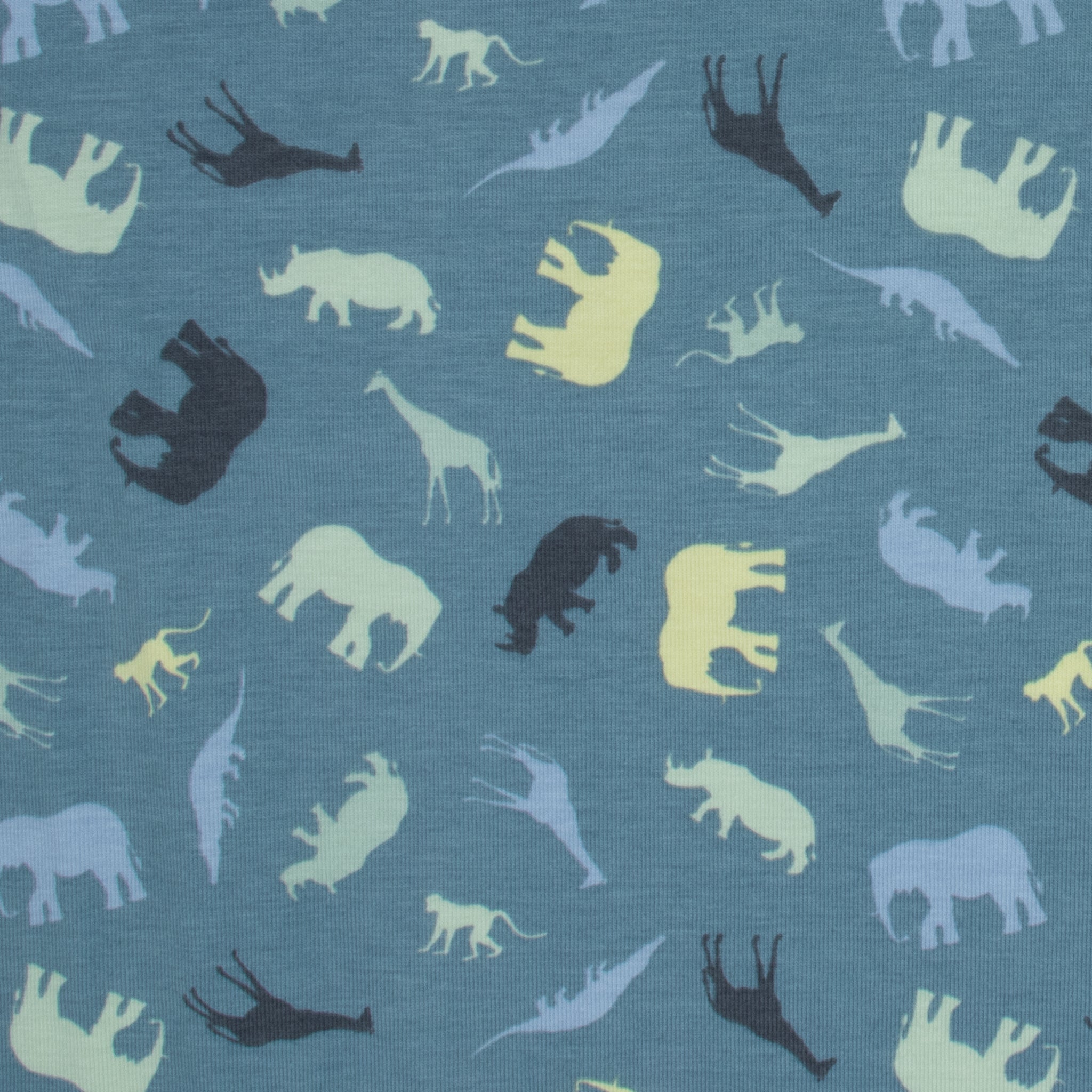Jersey Safari Blau – Jerseystoff mit Tier-Silhouetten auf blauem Hintergrund