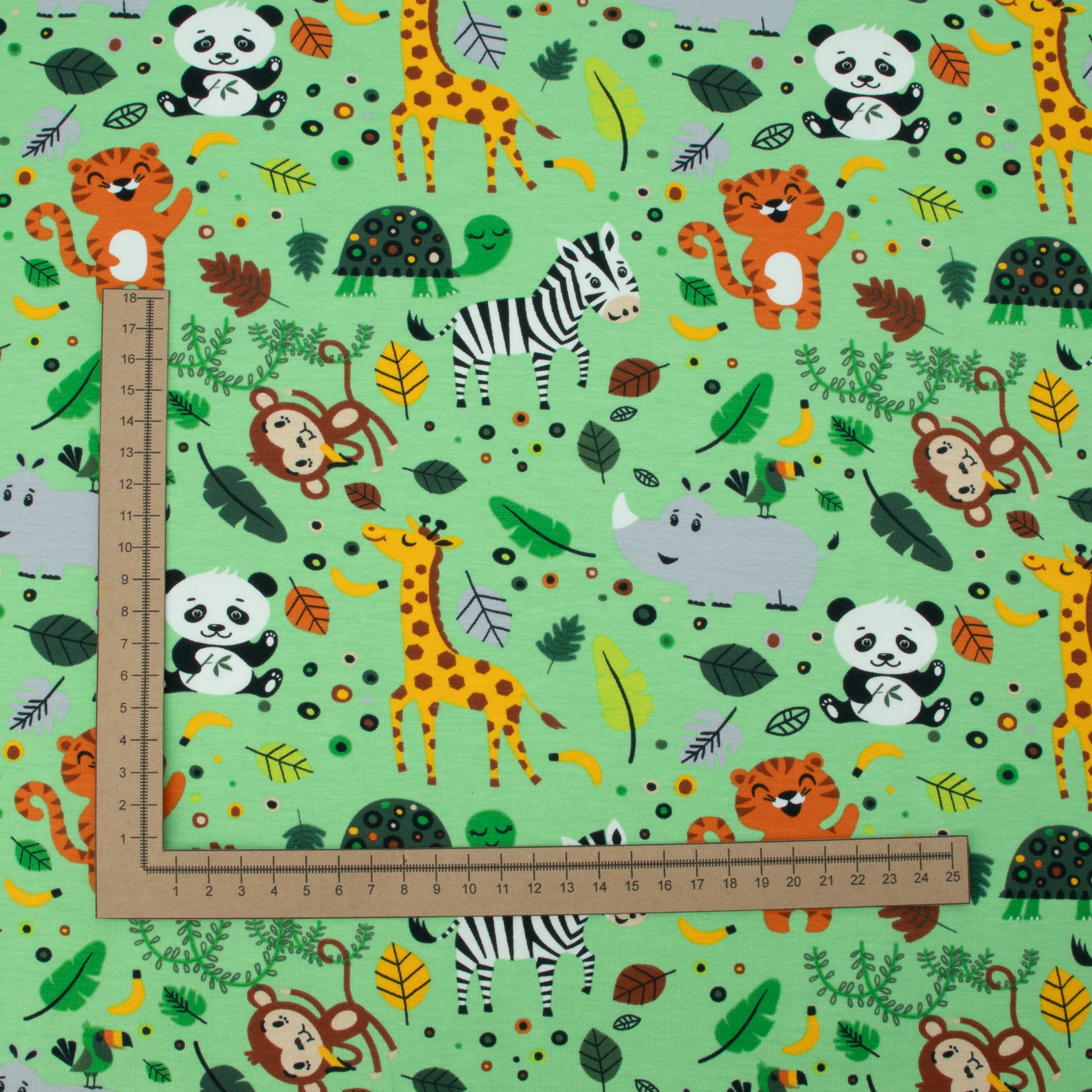 Jersey Safari Zoo – bunter Jerseystoff mit Tieren auf Hellgrün