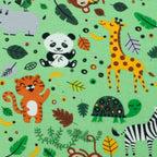 Jersey Safari Zoo – bunter Jerseystoff mit Tieren auf Hellgrün