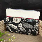 Flache kleine Reißverschlusstasche aus Canvas – schwarz/natur