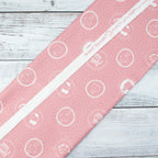 Baumwollstoff Tiergesichter Rosa – zartes Kindermotiv