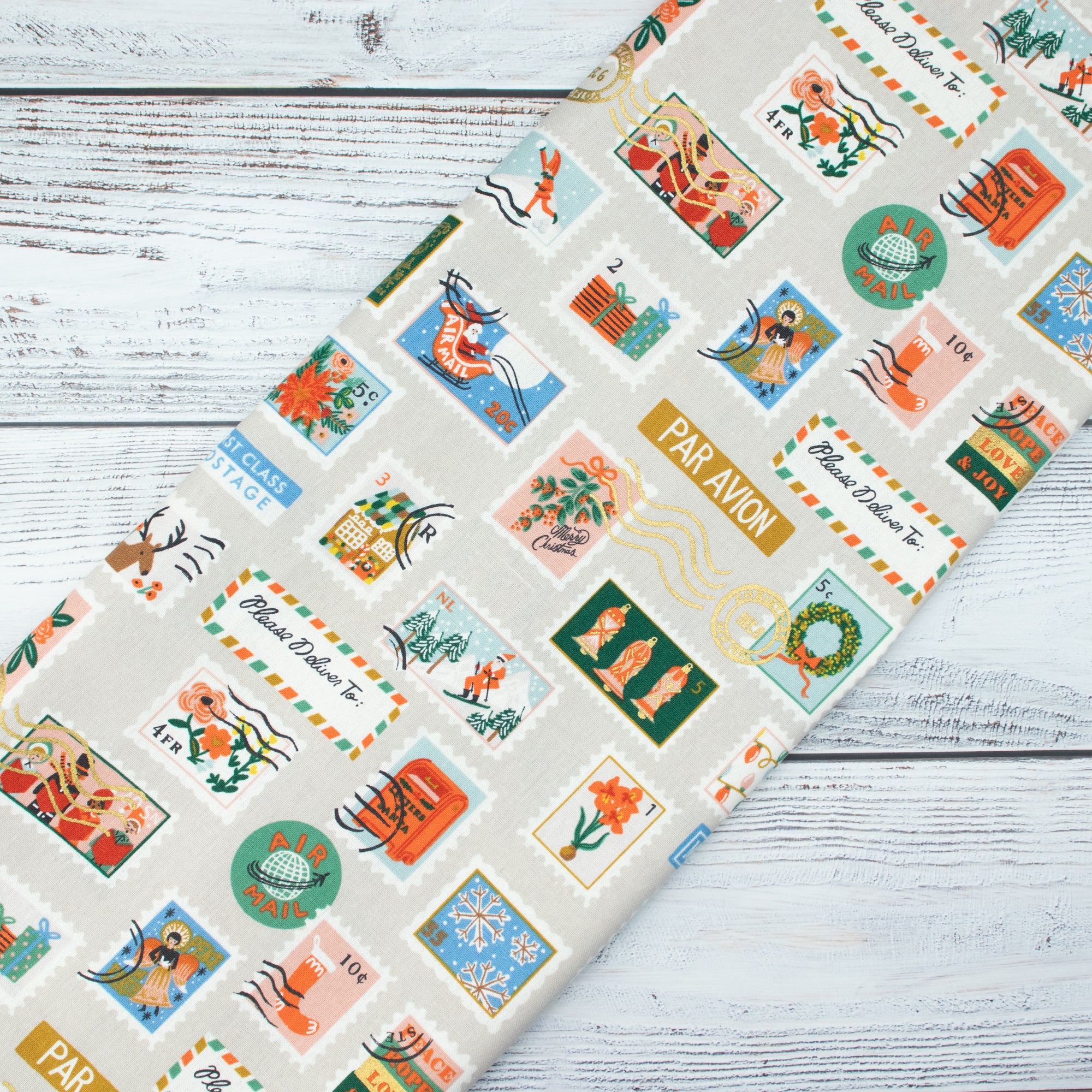 Cotton and Steel - Holiday Classics II - Holiday Stamps	Cream Canvas Metallic Fabric - Rifle Paper Co