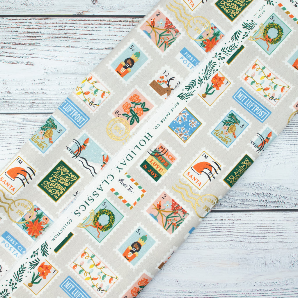 Cotton and Steel - Holiday Classics II - Holiday Stamps	Cream Canvas Metallic Fabric - Rifle Paper Co