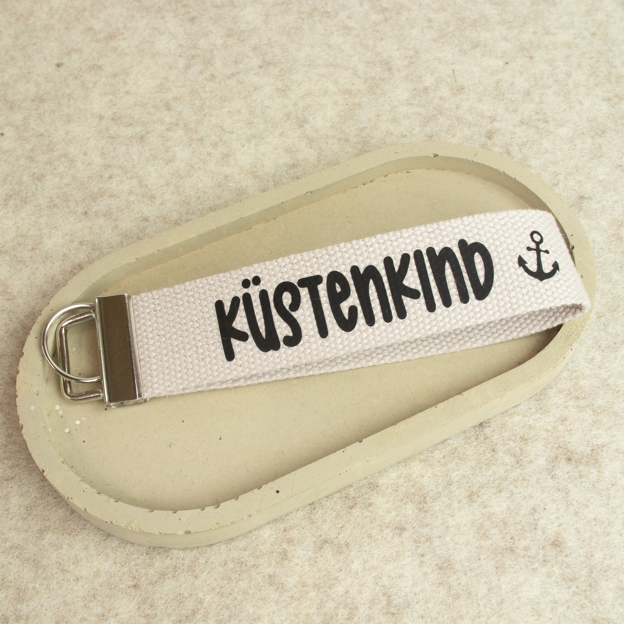 Schlüsselanhänger „KÜSTENKIND“ - schwarz – Baumwollband