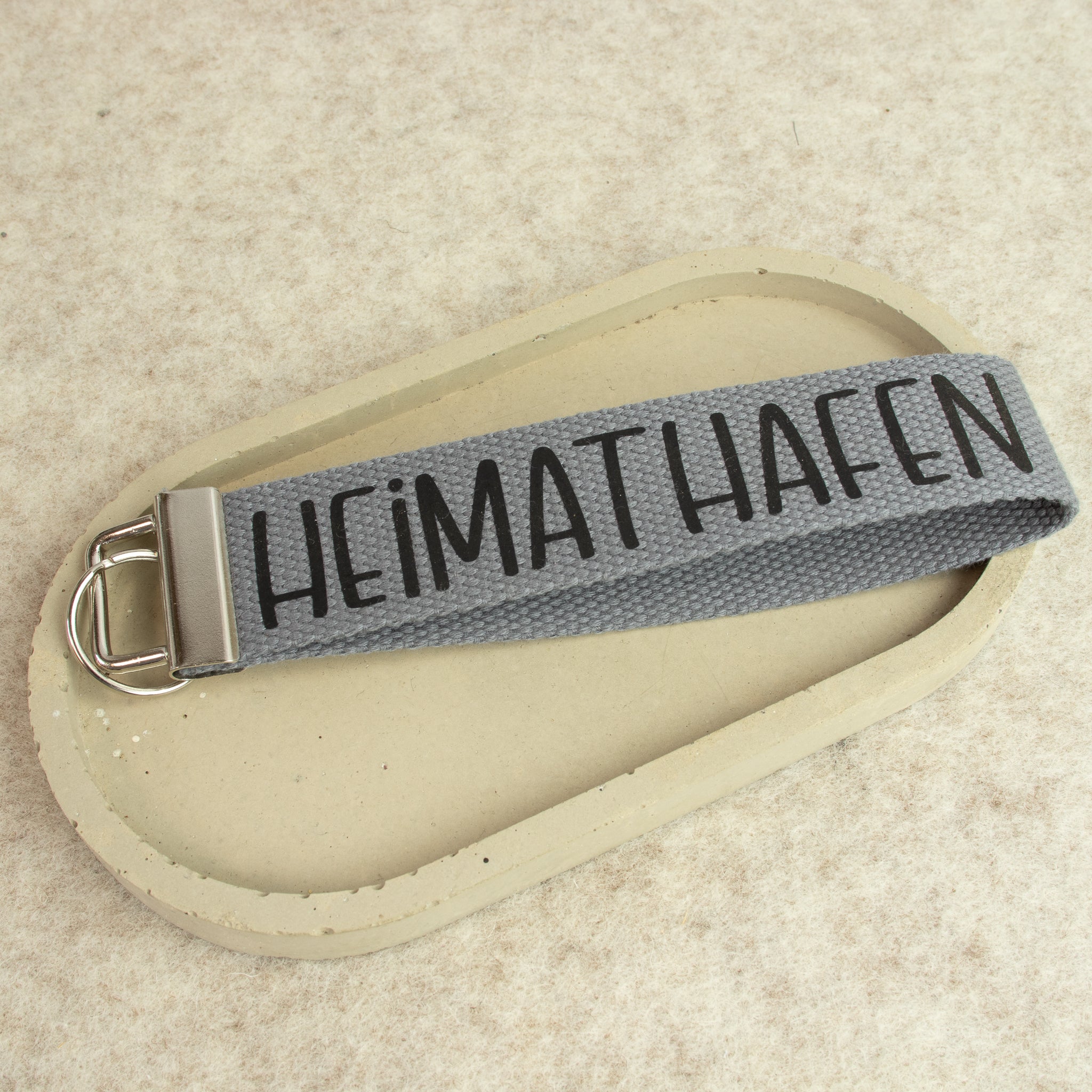 Schlüsselanhänger „HEIMATHAFEN“ – Schrift schwarz