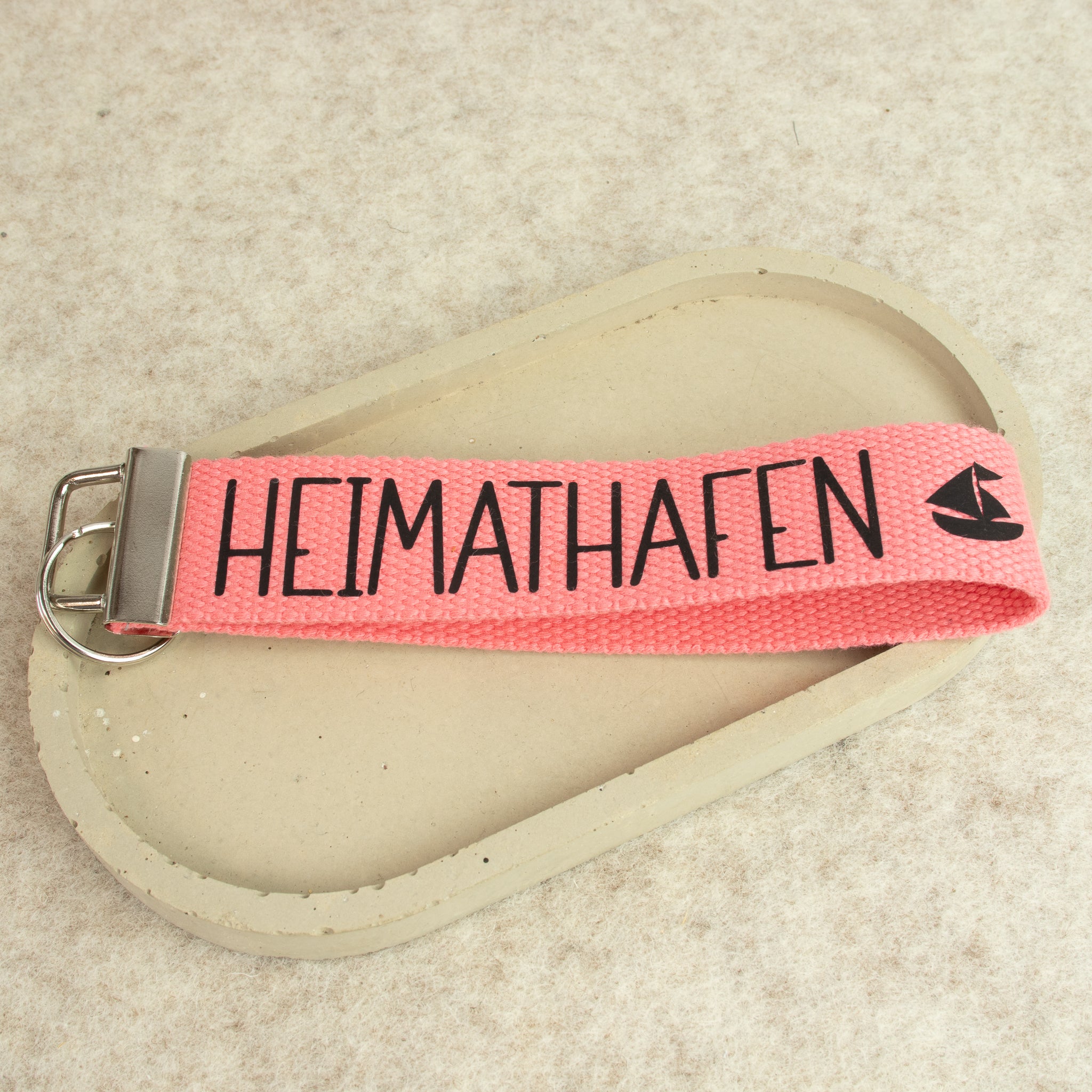 Schlüsselanhänger „HEIMATHAFEN“ – schwarze Schrift