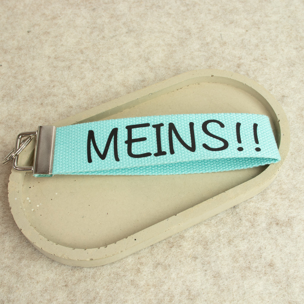 Schlüsselanhänger „MEINS!!“ – lustiger Schlüsselanhänger aus Baumwollband