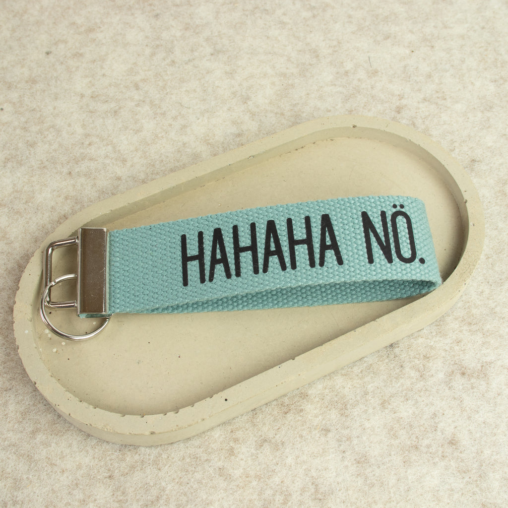 Schlüsselanhänger „HAHAHA NÖ.“ – schwarze Schrift