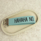 Schlüsselanhänger „HAHAHA NÖ.“ – schwarze Schrift