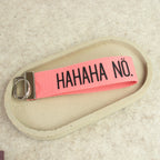 Schlüsselanhänger „HAHAHA NÖ.“ – schwarze Schrift