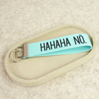 Schlüsselanhänger „HAHAHA NÖ.“ – schwarze Schrift