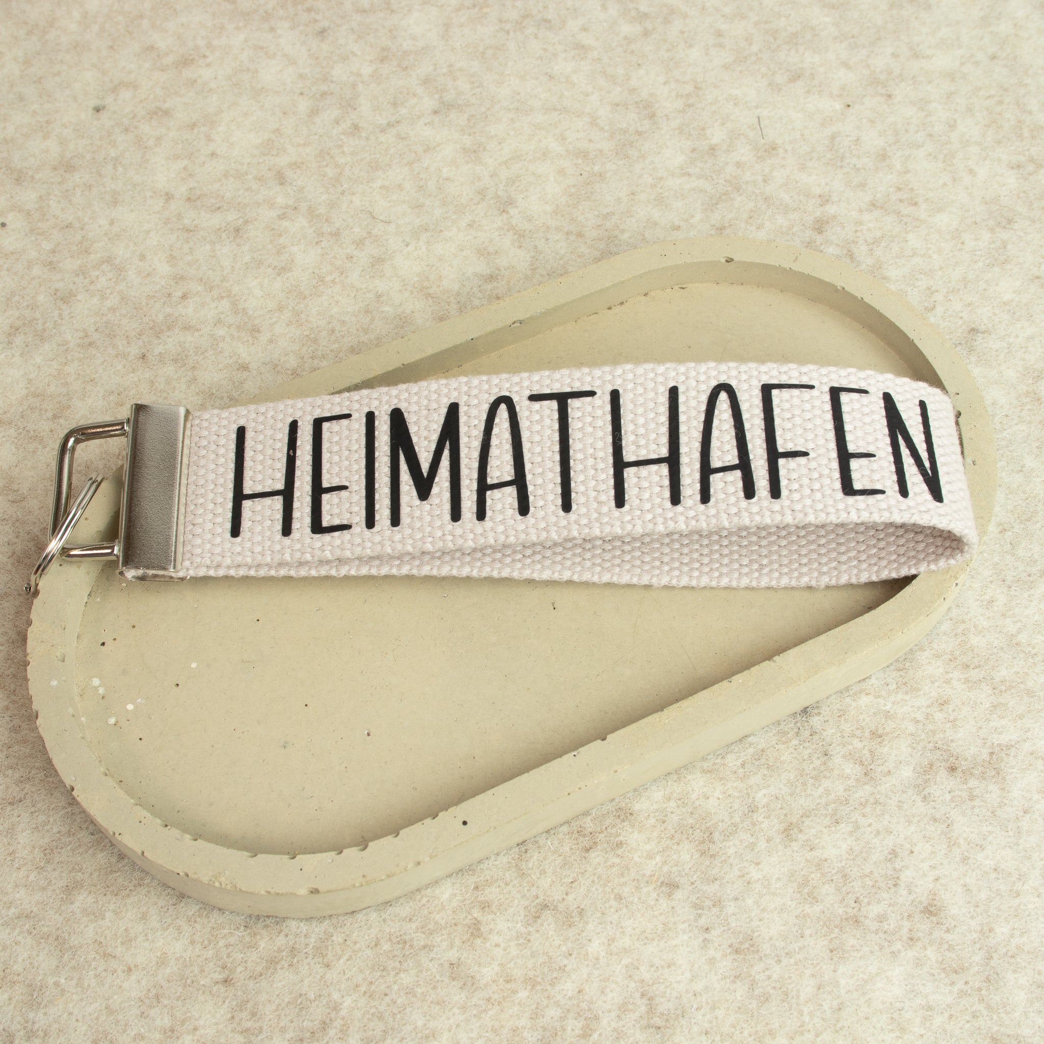 Schlüsselanhänger „HEIMATHAFEN“ – Schrift schwarz